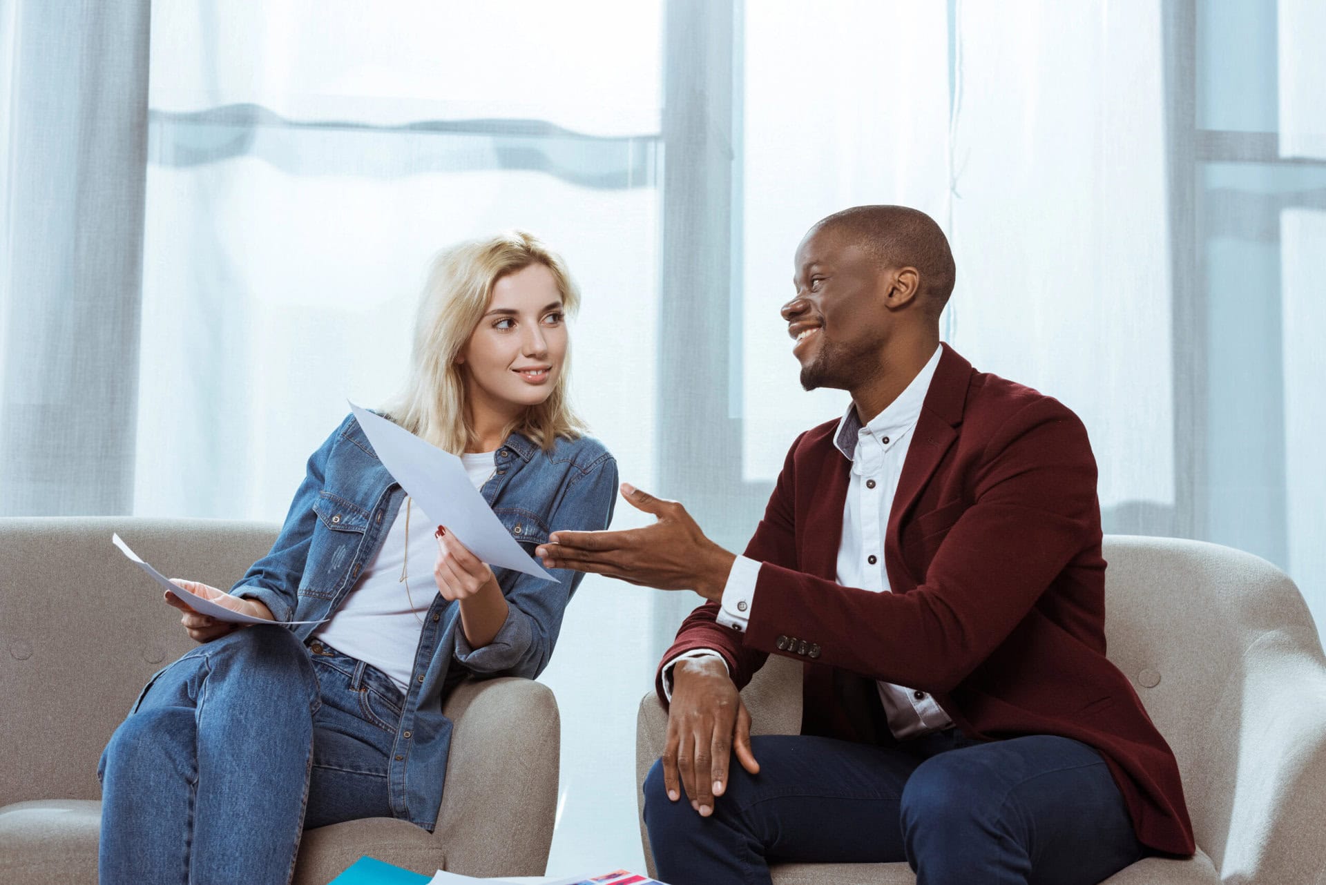 interracial photographers choosing photos together